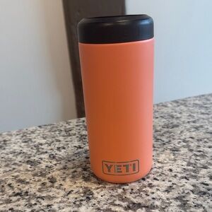 Yeti Coral Orange Tumbler with Black Lid